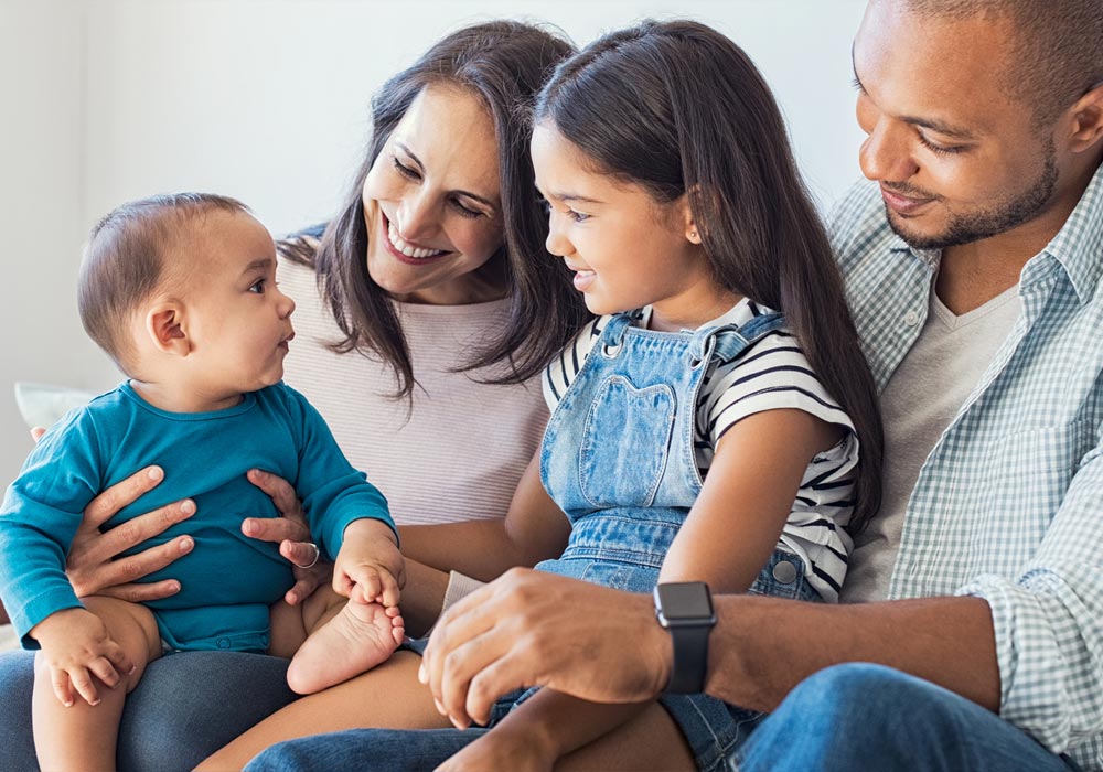 121 dental team standing together in dental surgery room